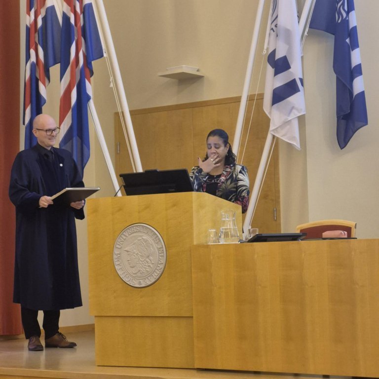 The university of Iceland confers a doctorate on Carina.