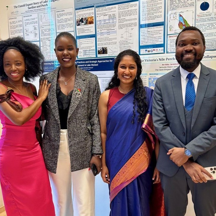 Graduating students present their research projects on posters. From left to right: Edna Arthus from Ghana, Funny Mkwiyo from Malawi, Sudeepa Ranasinghe from Sri Lanka, and Kelvin Mkvinda from Malawi.