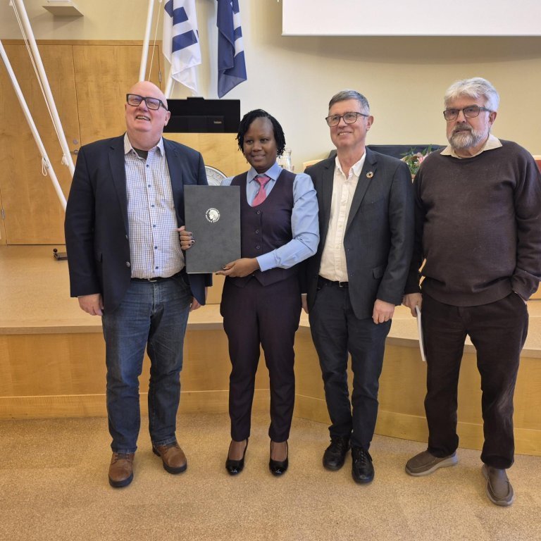 Safina with her main supervisor, Dr. Helgi Þór Thorarensen, and members of her doctoral committee, Dr. Tumi Tómasson and Dr. Sigurður S. Snorrason.