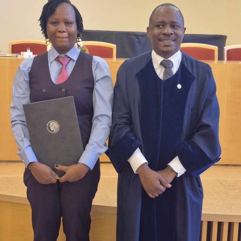 Safina and her second opponent, Dr. Nasser Kasozi, Director of Research, Buginyanya Zonal Agricultural Research and Development Institute, Uganda.
