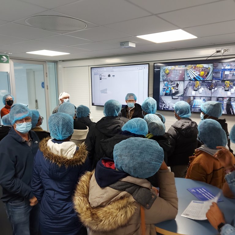 Fellows ask questions in the operations room