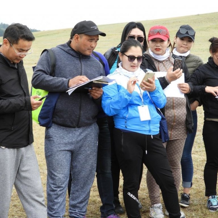 Course participants studying the LandPKS app which can be used to define the potential of land