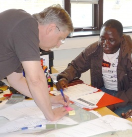 Jafaru Adam Musah (right) working on his study project in Gunnarsholt, South Iceland, where the SCSI headquarters are located