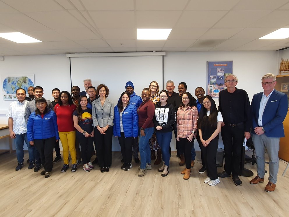 The Director General of UNESCO, Audrey Azoulay, and the fellows and staff