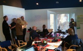 Workshop participants discussing curriculum.