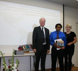 Ronald Verave receiving his certificate