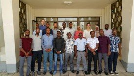 Participants and lecturers by the Palais du Peuple