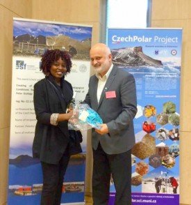 Thecla recieving her award