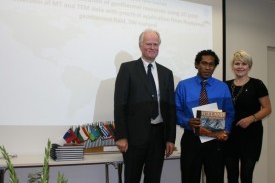 Ronald Verave receiving his certificate