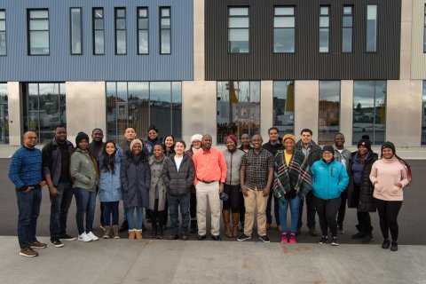 GRÓ-FTP's 2022 cohort of fellows, standing outside the Marine and Freshwater Research Institute at Fornubúðir Hafnarfirði.
