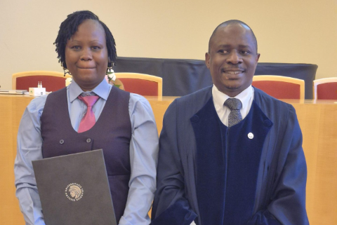 Safina and one of her opponents, Dr. Kasozi, Director of Research at the Buginyanya Research and Development Institute in Uganda.