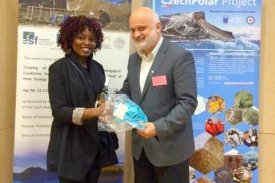 Thecla recieving her award