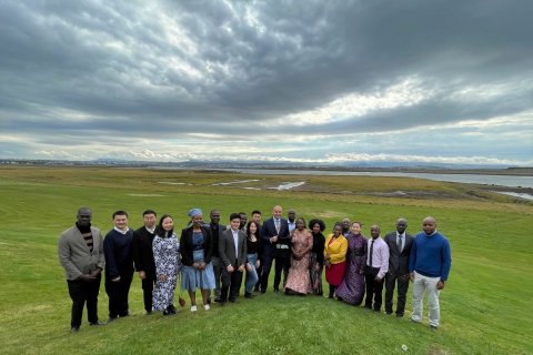 The President and the fellows with Bessastaðir wetland restoration site in the background